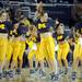 Members of the Michigan dance team perform during half time at Crisler Center on Wedensday. Melanie Maxwell I AnnArbor.com